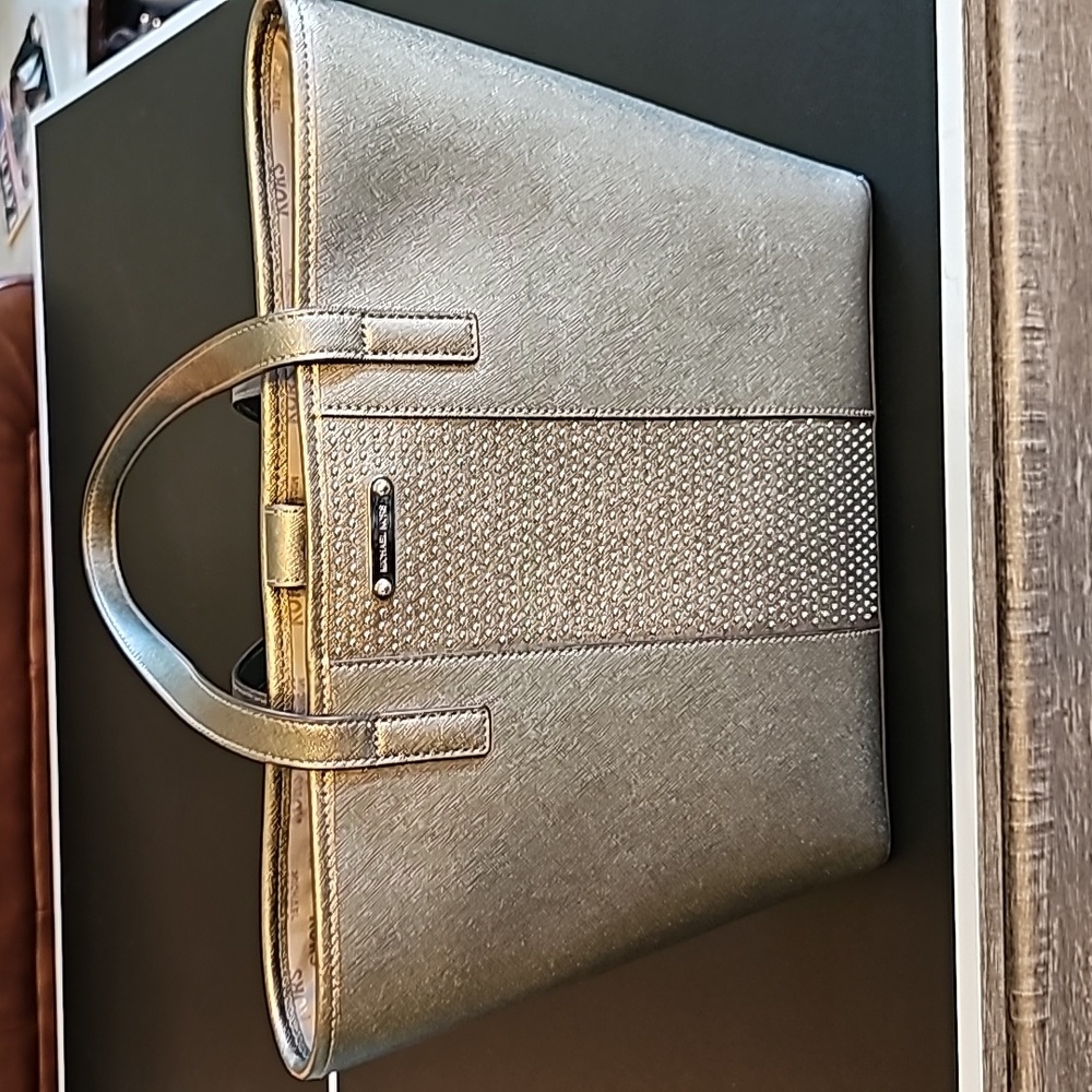 Michael Kors gray studded purse.